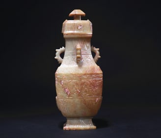 HAN DYNASTY JADE BOTTLE WITH ANIMAL PATTERNS
