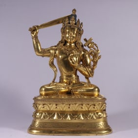 A QING DYNASTY MONGOLIAN GILDED BRONZE MANJUSRI BODHISATTVA