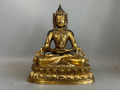 QING DYNASTY GILDED BRONZE BUDDHA OF LONGEVITY: Name QING DYNASTY GILDED BRONZE BUDDHA OF LONGEVITY Dimensions H:32CM L:23CM Condition Additional photographs and Condition reports are provided by request as a courtesy to our clients,