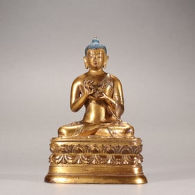 A GILDED MONGOLIAN BUDDHA STATUE FROM THE MING DYNASTY