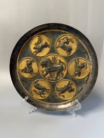 TANG DYNASTY SILVER GILDED PERSIAN BEAST PLATE