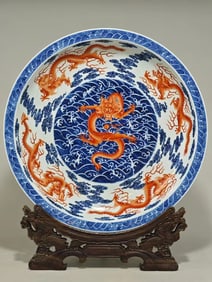 QING DYNASTY BLUE AND WHITE PLATE WITH RED DRAGON PATTERN