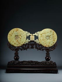 YELLOW JADE DRAGON AND PHOENIX BI FROM THE QING DYNASTY