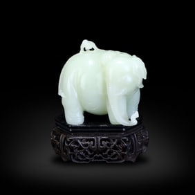 Qing Dynasty Hetian white jade ornament of "elephant with monkey"