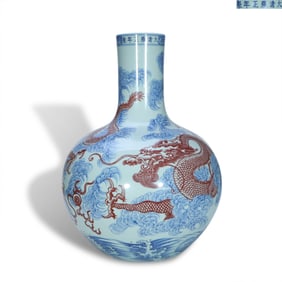 Qing Yongzheng period a Blue-and-white and underglaze red celestial sphere vase with the pattern of