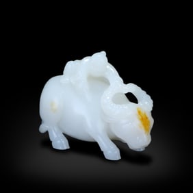 Qing Dynasty Hetian white jade ornament of a boy herding cattle