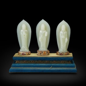 Qing Dynasty Hetian jade statue of the Three Buddhas