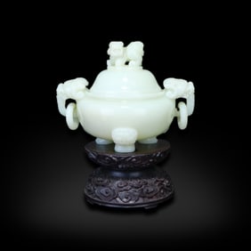 Qing Dynasty Hetian white jade incense burner with three feet, double handles, movable rings, and a