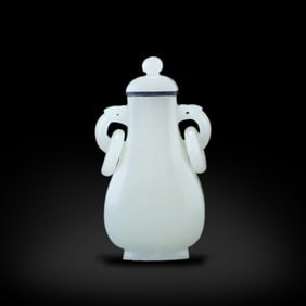 Qing Dynasty Hetian white jade snuff bottle with double handles and movable rings