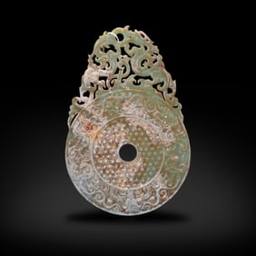 Han Dynasty Jade disc with dragon patterns and protruding edges