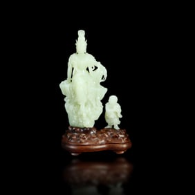 Qing Dynasty Hetian white jade ornament of a boy worshiping Avalokiteshvara