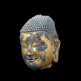 Northern Wei Dynasty stone Buddha head with gilded paste