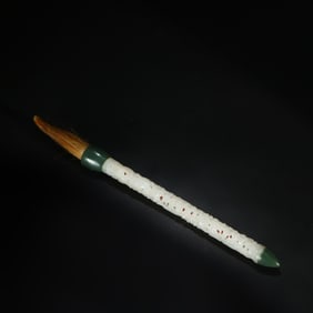 Qing Dynasty Hetian white jade brush with openwork dragon-cloud motifs