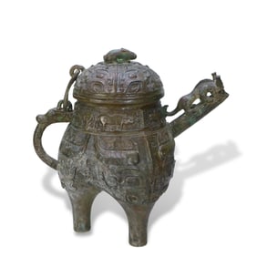 Western Zhou Dynasty Bronze he with beast face