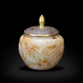 Tang Dynasty Soapstone relic jar carved with lotus motifs, with a gilt-silver scrolling grass