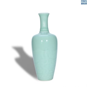 Kangxi period Qing Dynasty Celadon glaze zun vessel with incised hidden dragon-and-sea-wave patterns