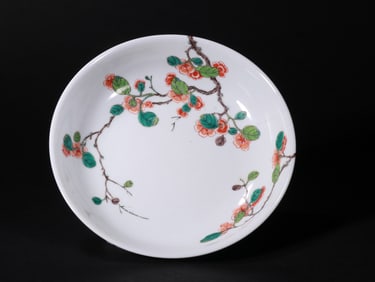 A MULTICOLORED PLATE WITH PATTERNS OF FRUITS AND MELONS FROM THE QING DYNASTY