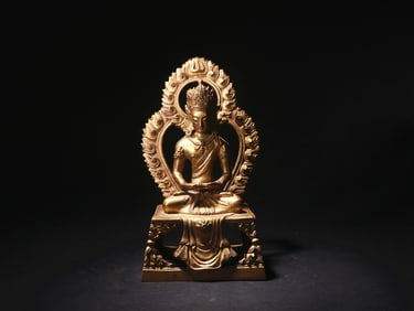 A GILDED COPPER BUDDHA STATUE FROM THE QING DYNASTY
