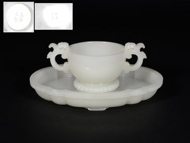 A SET OF WHITE JADE CUPS AND PLATES FROM THE JIAQING PERIOD OF THE QING DYNASTY
