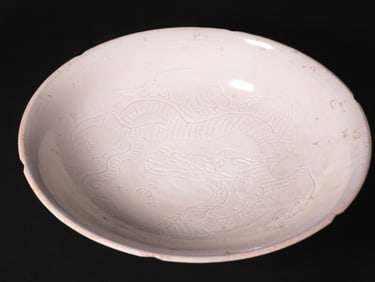 A DRAGON PATTERN PLATE FROM THE DING KILN OF THE SONG DYNASTY