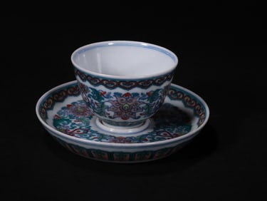 A SET OF CUP BUTTERFLIES WITH FLORAL PATTERNS IN DOUCAI FROM THE QING DYNASTY