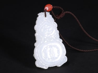 A WHITE JADE PLAQUE FROM THE QING DYNASTY