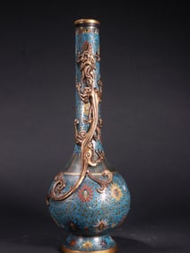 A LONG-NECKED CLOISONNE DRAGON-SHAPED BOTTLE FROM THE QING DYNASTY