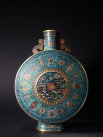 A CLOISONNE ENAMEL FLOWER-PATTERNED MOON-HUGGING VASE FROM THE QING DYNASTY