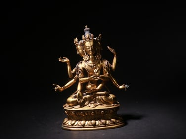 A GILDED COPPER BUDDHA STATUE FROM THE QING DYNASTY