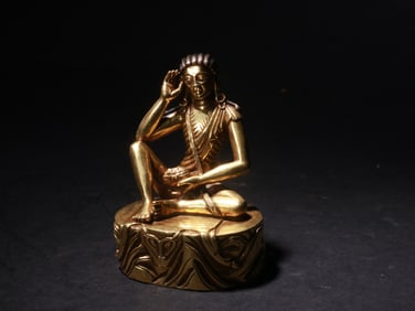 A GILDED COPPER BUDDHA STATUE FROM THE QING DYNASTY
