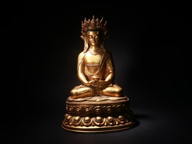 A GILDED COPPER BUDDHA STATUE FROM THE QING DYNASTY