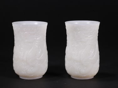A PAIR OF WHITE JADE CUPS FROM THE QING DYNASTY