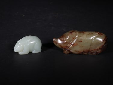 JADE PIECES IN THE SHAPE OF BEASTS FROM THE MING DYNASTY