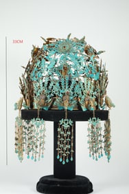 A QING DYNASTY SILVER-GILT NINE-PHOENIX CROWN WITH KINGFISHER FEATHERS