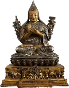 A QING DYNASTY GILDED SILVER STATUE OF TSONGKHAPA