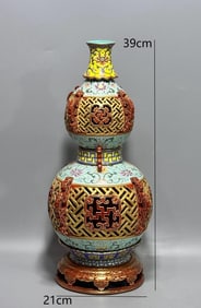 QING DYNASTY ENAMEL CARVED HOLLOW MULTI-HANDLED ROTATING HEART VASE