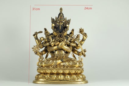 A QING DYNASTY GILDED BRONZE DOUBLE-BODIED BUDDHA STATUE