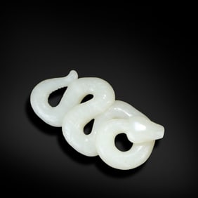Ming Dynasty Hetian jade pendant carved in the shape of a snake