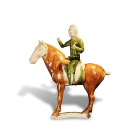 Tang Dynasty Tri-color figurine of a horseman beating a drum