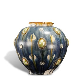 Tang Dynasty Tri-color jar with applied patterns
