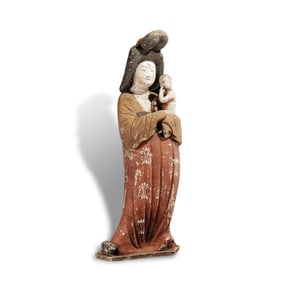 Tang Dynasty Painted pottery figurine holding a child