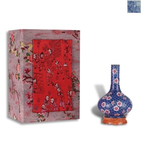 Qing Dynasty Qianlong period, Famille rose vase with blue ground, with coral-red glazed base