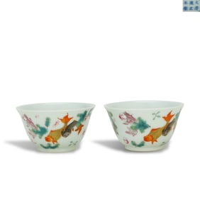 Qing Dynasty Yongzheng period, A pair of famille rose cups with fish and algae patterns