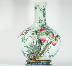 QING DYNASTY FAMILLE ROSE NINE PEACHES CELESTIAL GLOBE VASE