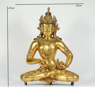 A MING DYNASTY GILT AND GEM-INLAID VAJRASATTVA