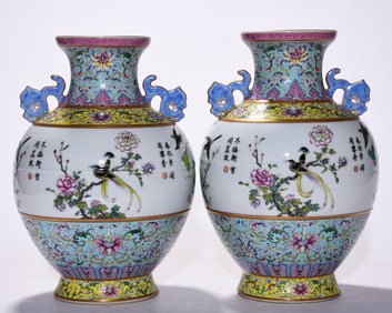 A PAIR OF QING DYNASTY FAMILLE ROSE FLOWER AND BIRD DOUBLE-EARED VASES