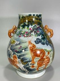 QING DYNASTY FAMILLE ROSE QILIN DOUBLE-EARED GILDED VASE