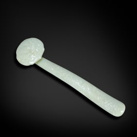 Qing Dynasty Hetian jade ruyi scepter carved with fish and dragon patterns