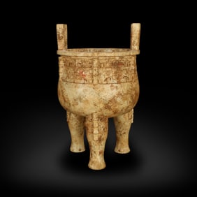 Warring States beast face pattern jade tripod