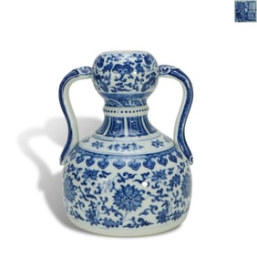 Qing Dynasty Qianlong period, Blue-and-white ruyi zun with interlocking lotus patterns and ribbon